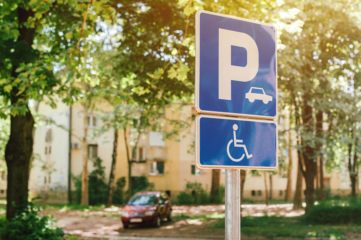 Parking spot sign space for people mobility issues